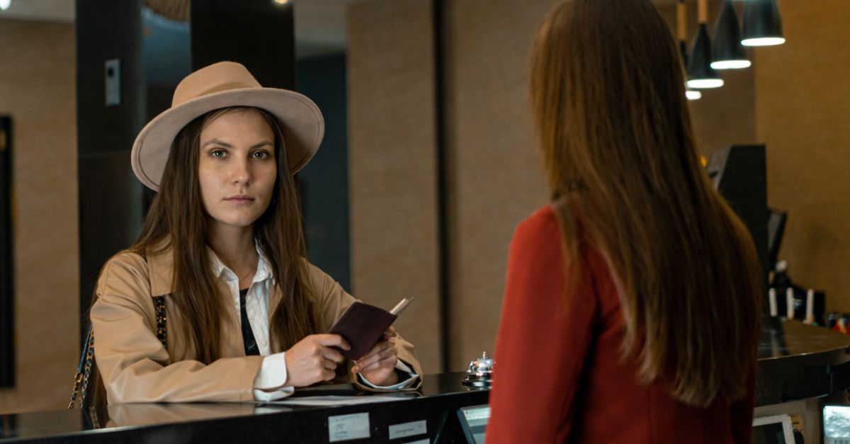 Woman at hotel reception