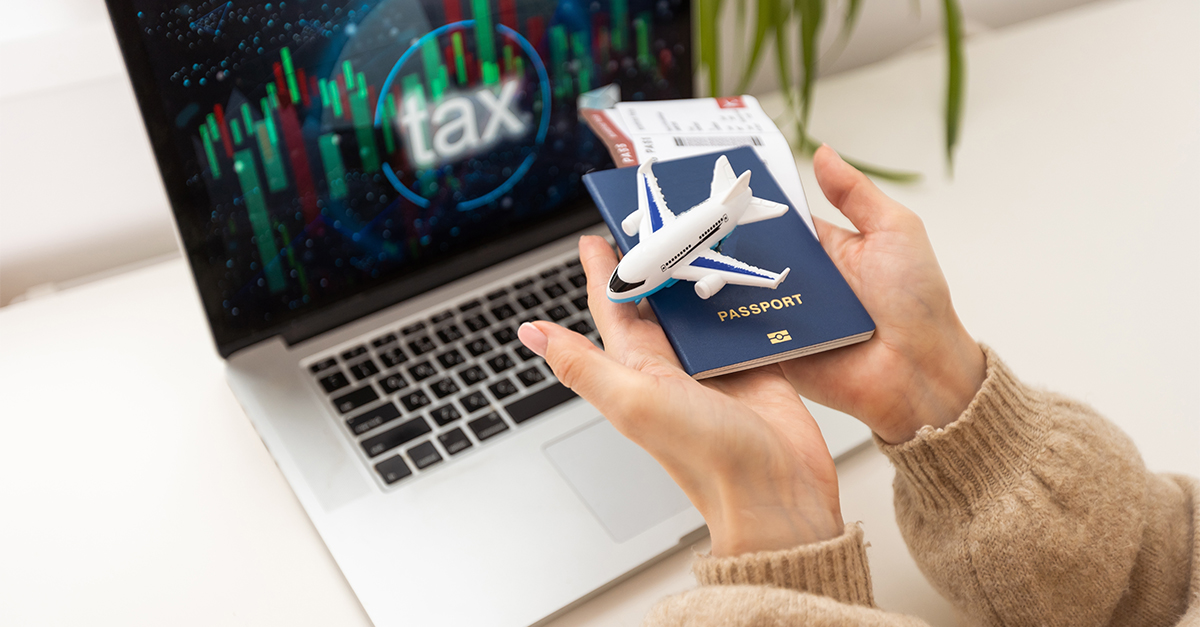 International business and strategy concept. Laptop with toy plane