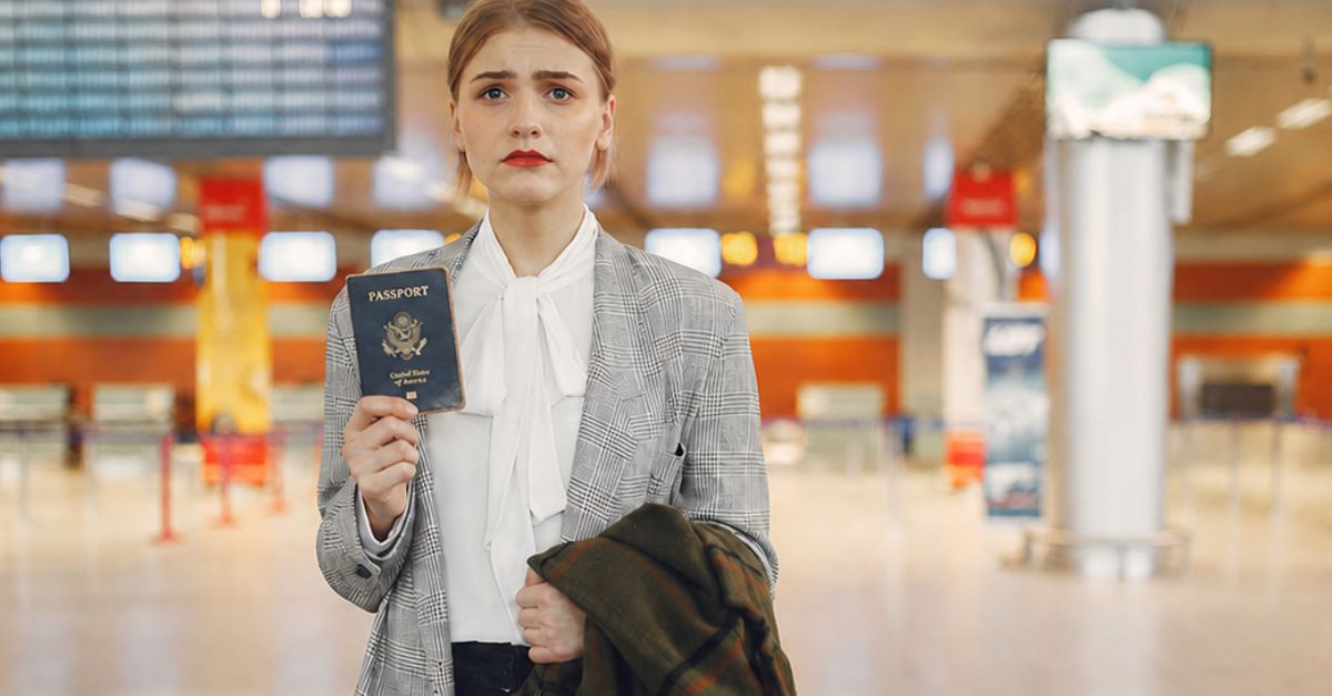 Sad Woman With An Old Passport