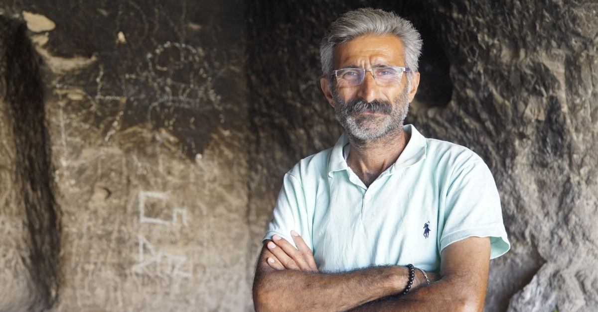 portrait-of-man-in-rock-cave