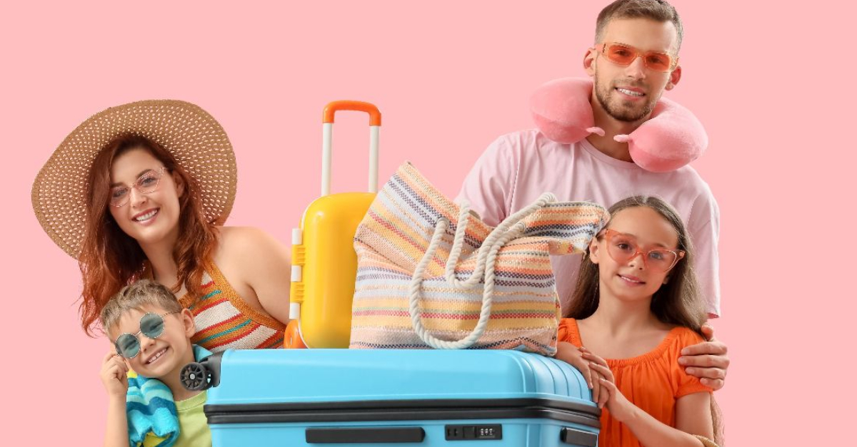 Family of tourists with suitcases and beach accessories on pink background