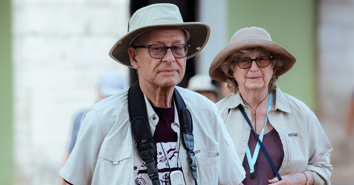 tourist-couple-crossing-a-street