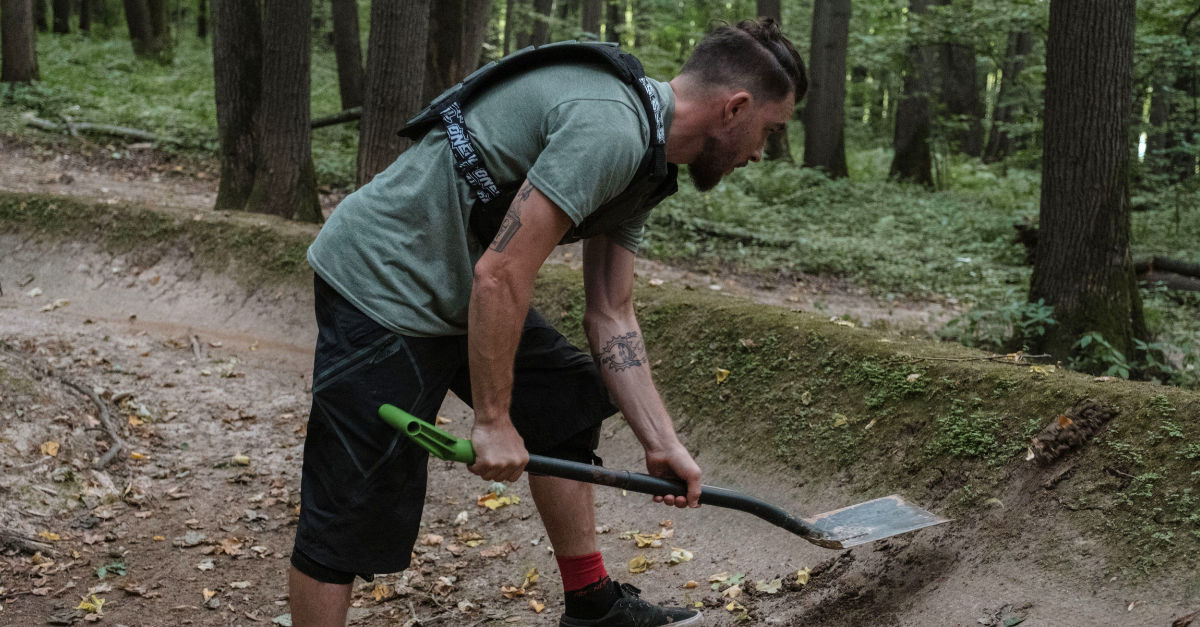 a-man-digging-in-the-forest