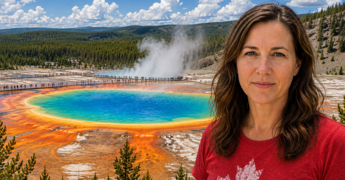 Canadian woman looking at camera, national park in background