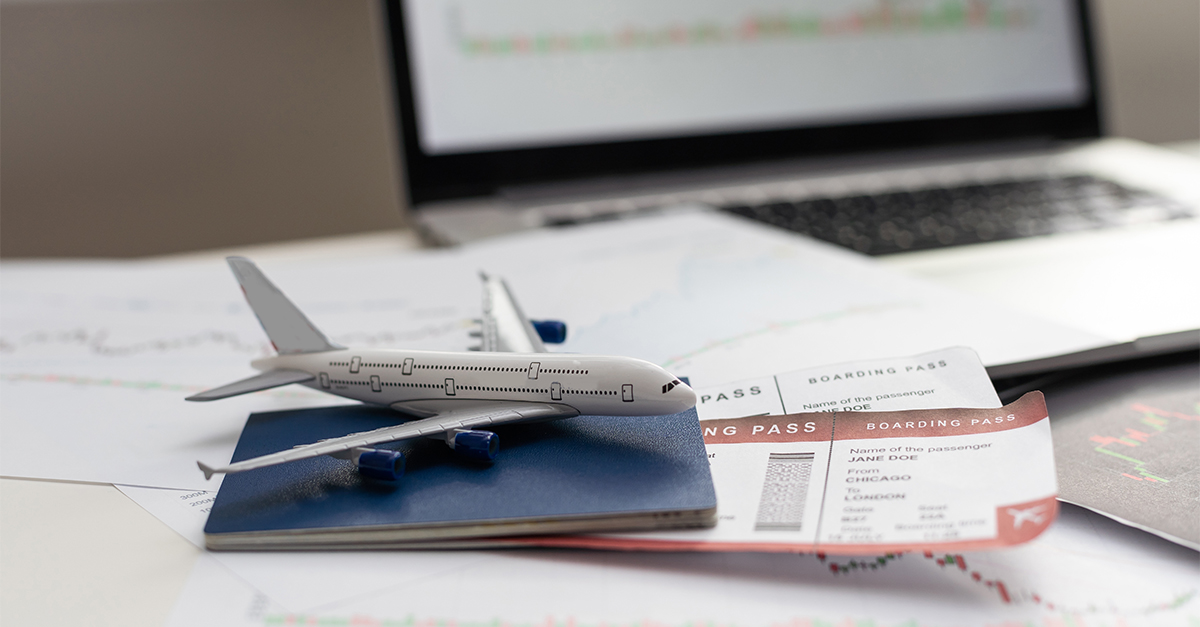 Airplane and money. Plane on the background of USA dollars. The cost of travel, air tickets and flights, financial expenses for vacation.