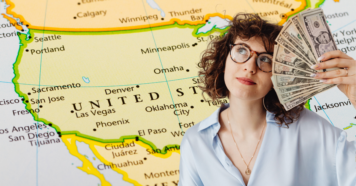 curly-haired-woman-holding-paper-money